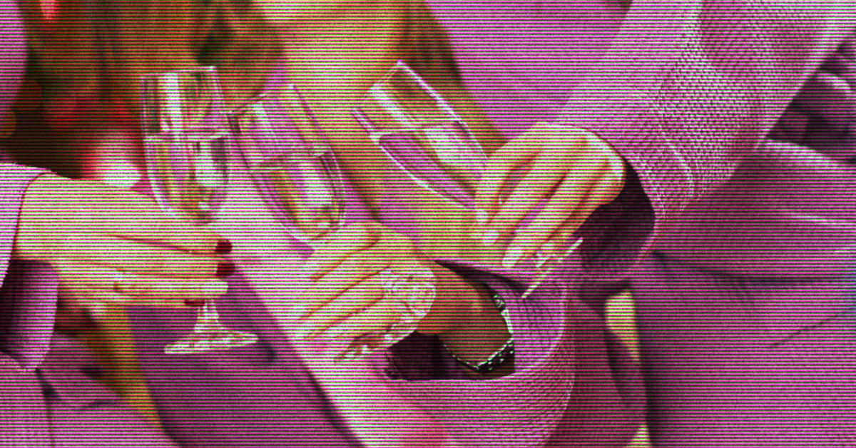 Three manicured hands cheers with champagne glasses.